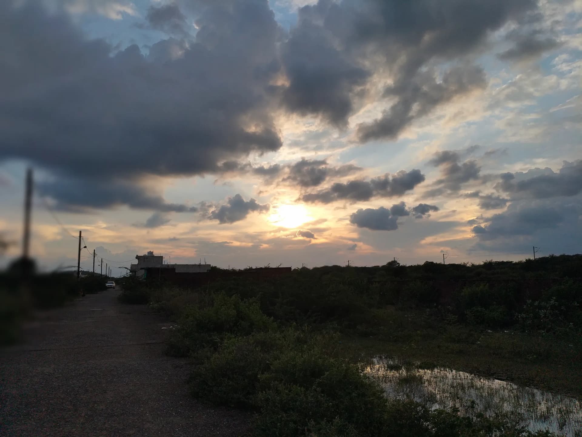 Sunset over a quiet rural road